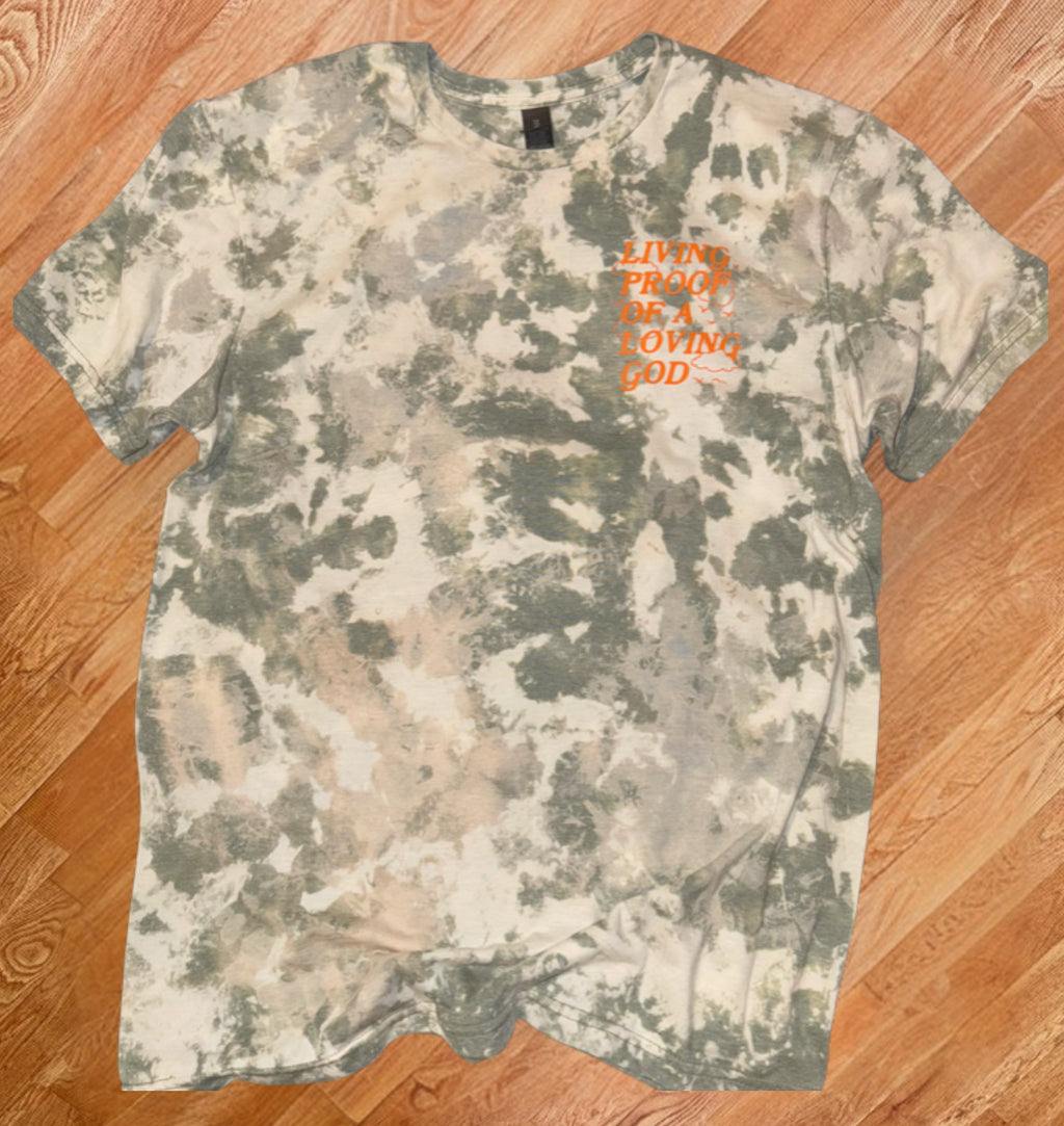 Camo Styled Bleached Tshirt with Hunter orange lettering saying “Living Proof Of A Loving God”