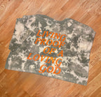 Camo Styled Bleached Tshirt with Hunter orange lettering saying “Living Proof Of A Loving God”